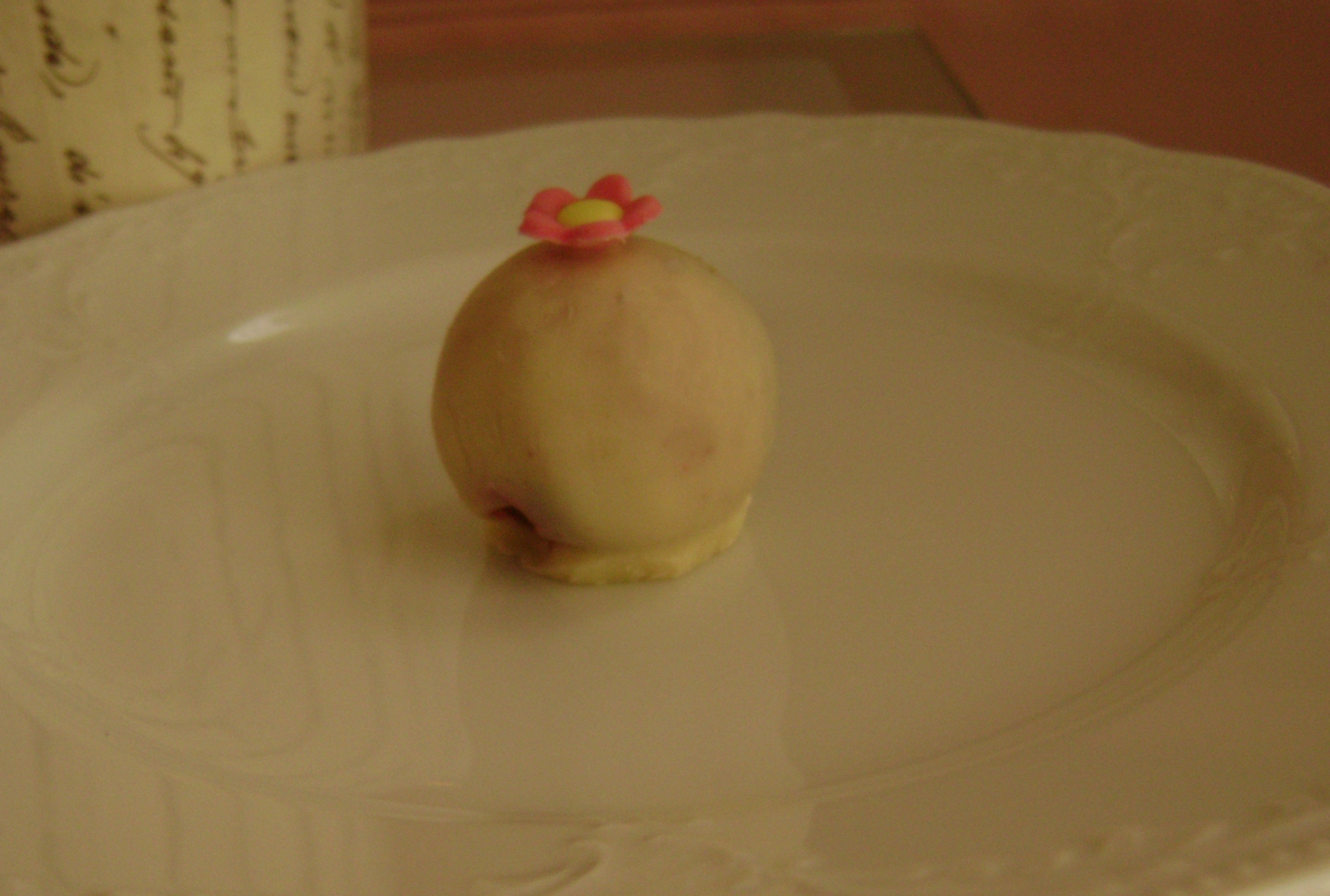 red velvet cake truffle coated with white chocolate