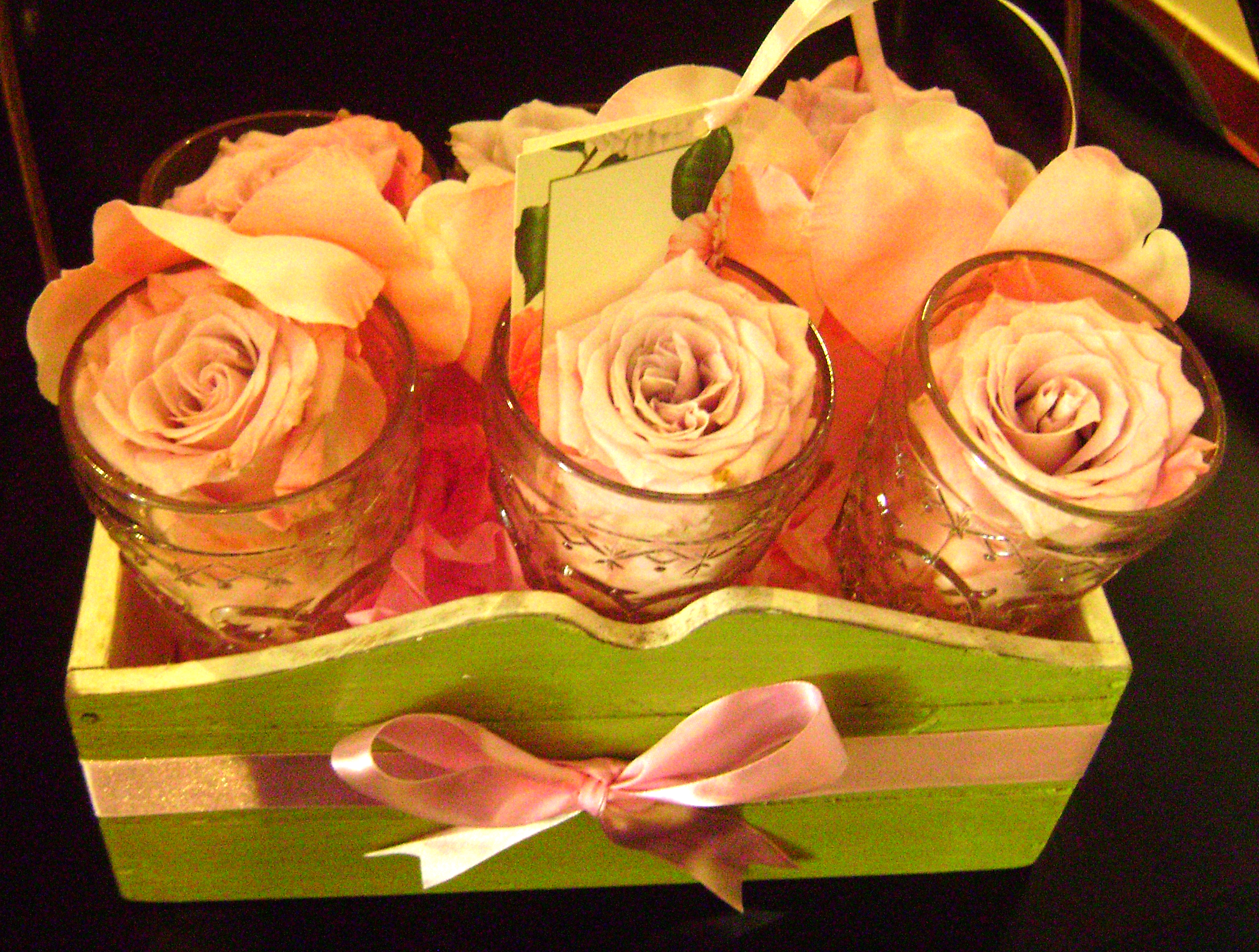 gift for newly wed couple - 6 glass cups filled with pink rose heads and placed in a wooden green basket 